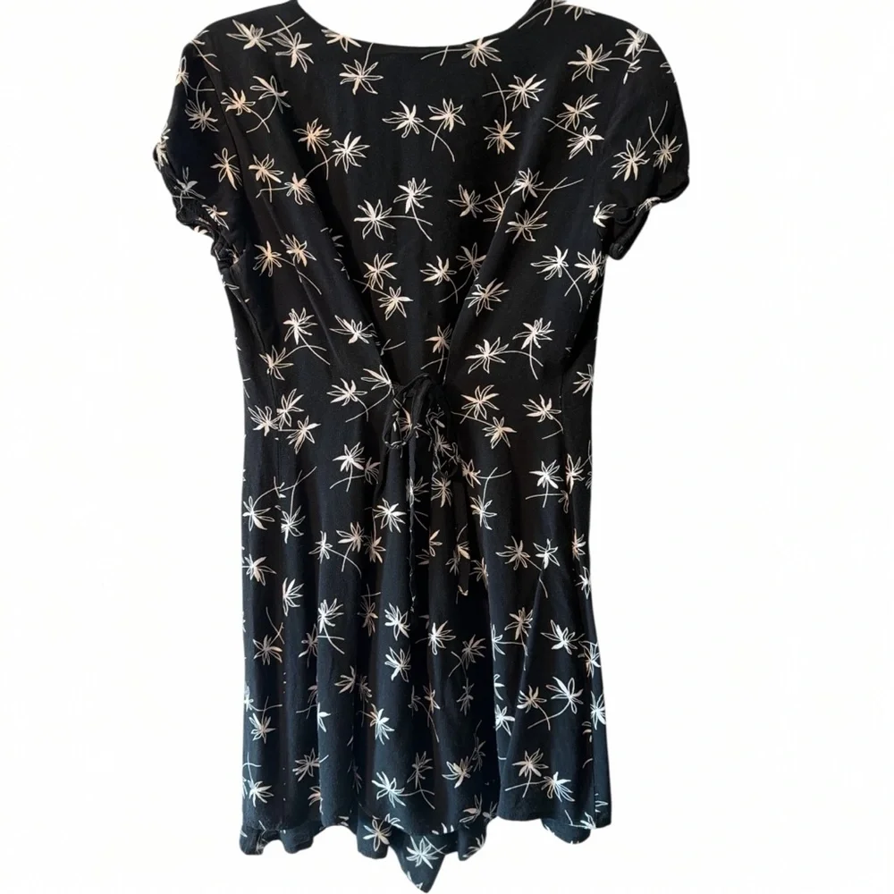 Limited Black Floral Button Front Tie Back Romper Medium